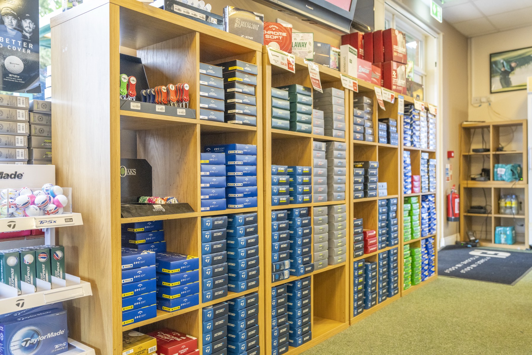 Golf balls and accessories on display in the Pro Shop at The Oaks, Carshalton, Surrey